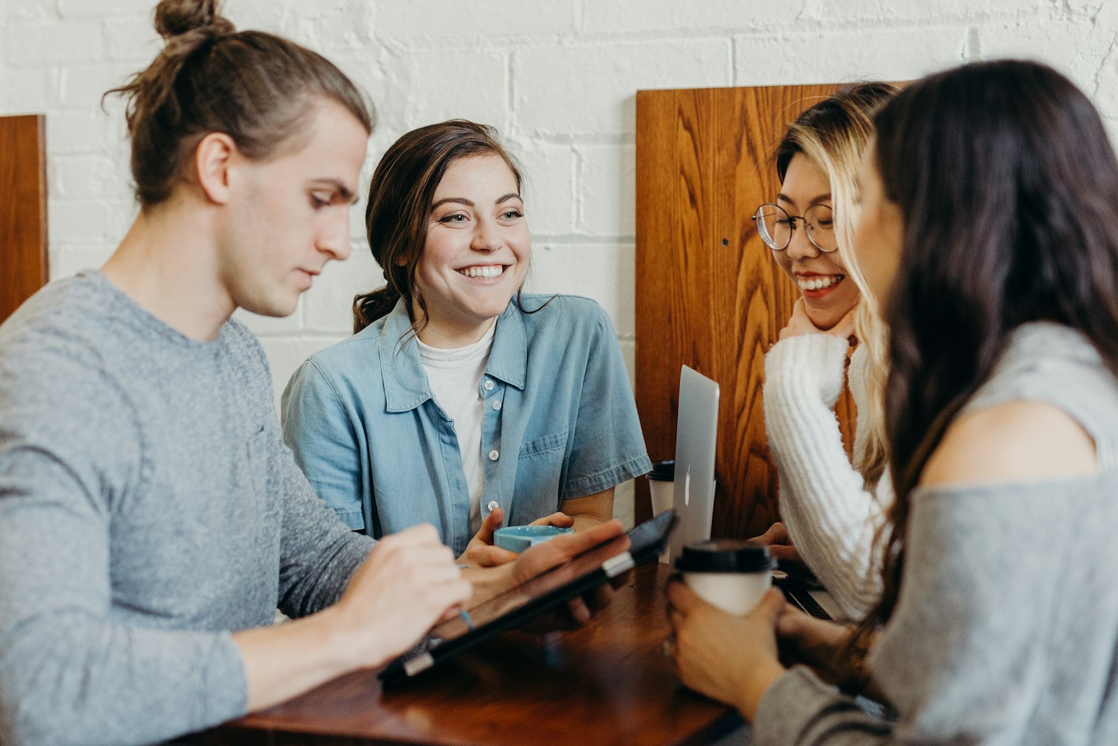 Group reviewing a tablet together